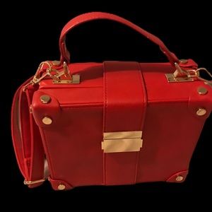 Red suitcase purse